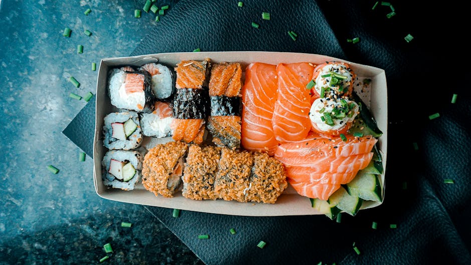 Delicious assortment of sushi with nigiri, maki, and sashimi beautifully presented.