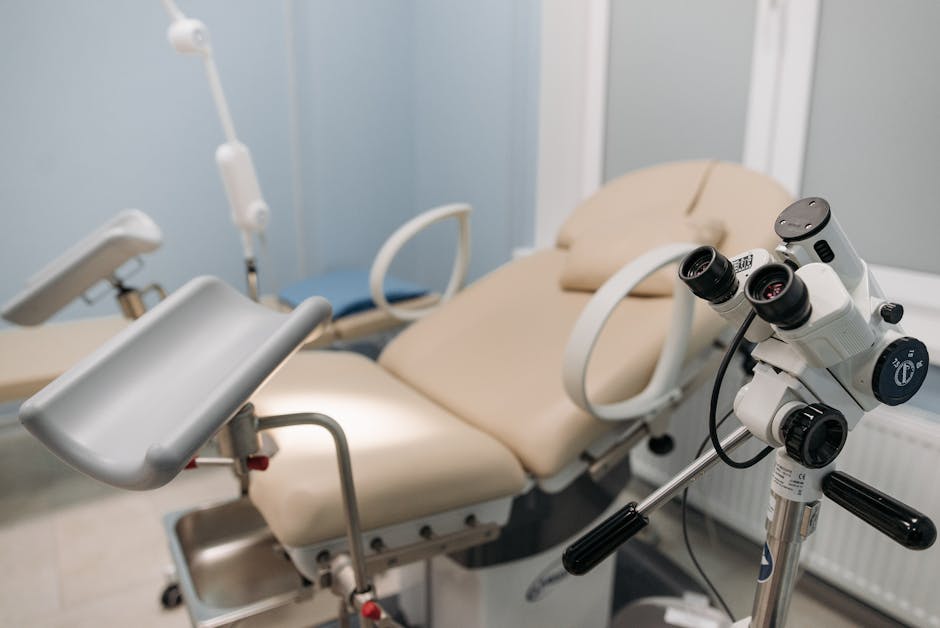 A sterile and well-equipped medical examination room with a focus on precision instruments.