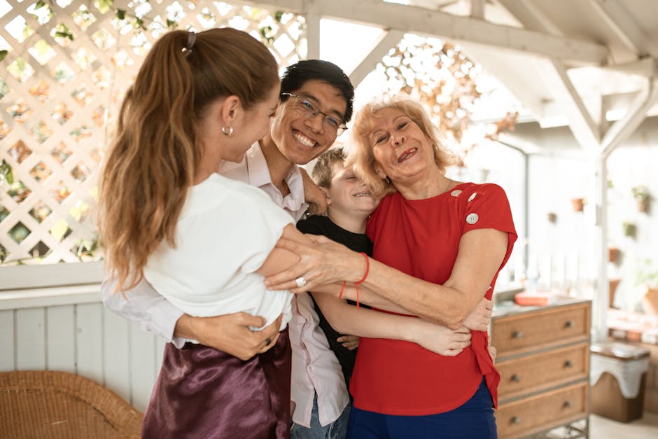 A joyful family group hug with diverse members expressing love and happiness.
