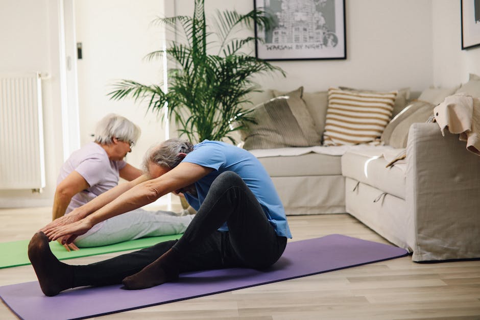 Two senior adults performing yoga stretches in a cozy living room setting.