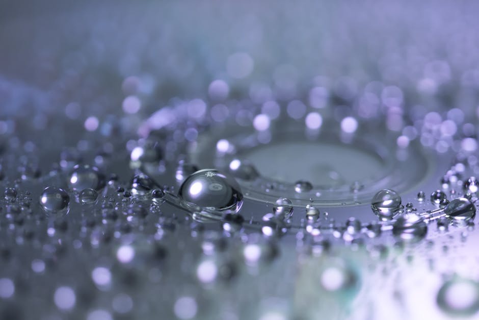 Captivating macro photograph of water droplets highlighting reflection and clarity.