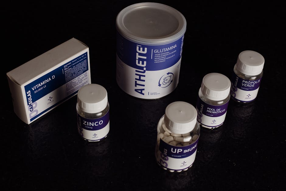 Close-up of a variety of nutritional supplements, vitamins, and probiotics.