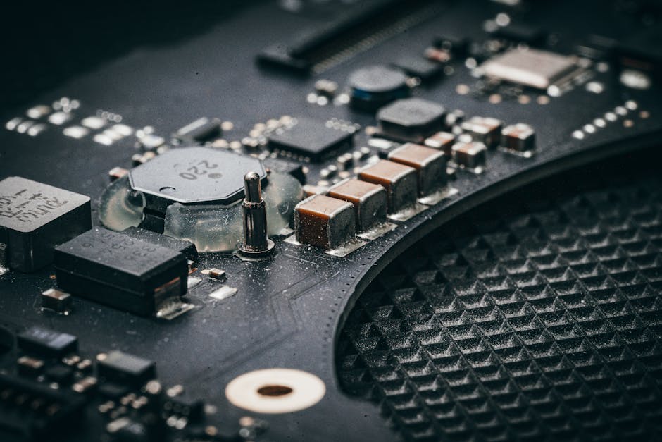Detailed macro shot of an electronic circuit board showcasing various components.