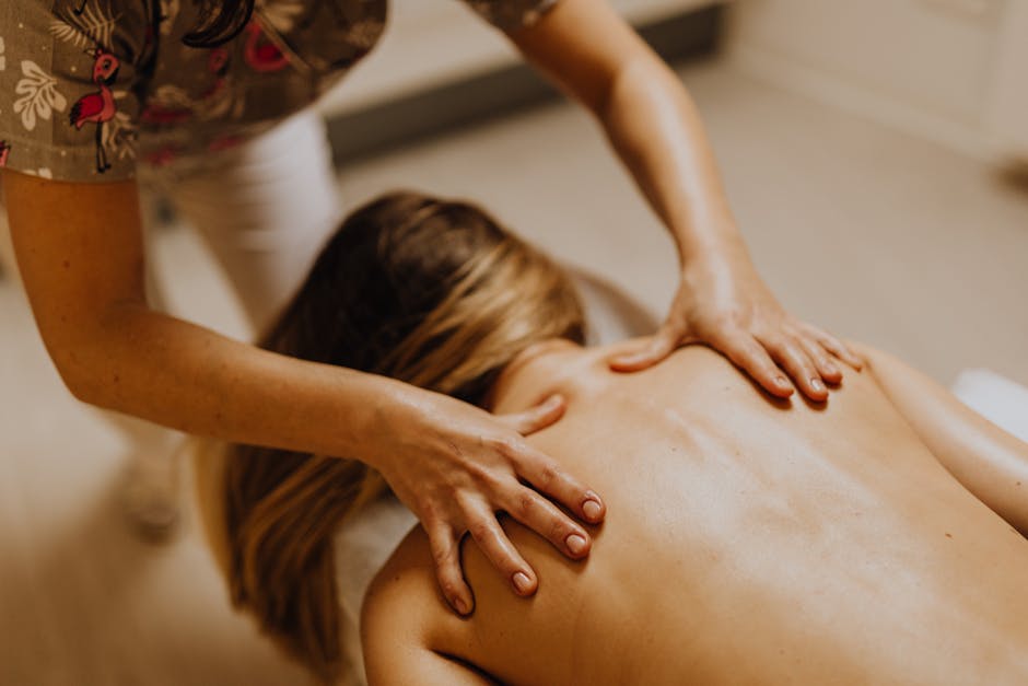 A soothing indoor massage therapy session focused on relaxation and wellness.