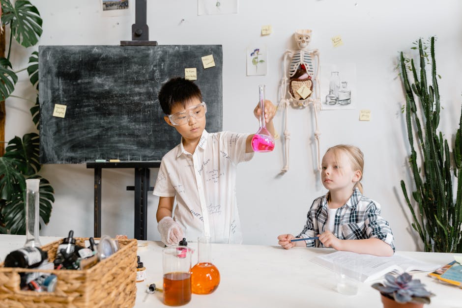 Kids experimenting with lab equipment in a science class, learning about chemistry.