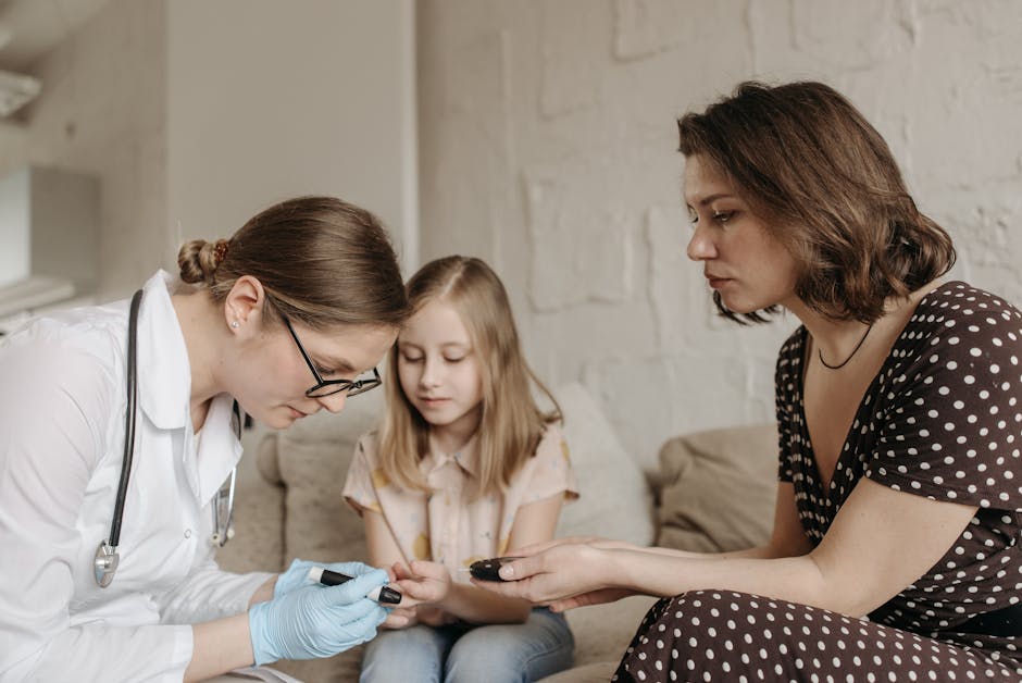 A pediatrician checks a child's blood sugar levels while her mother assists at home.