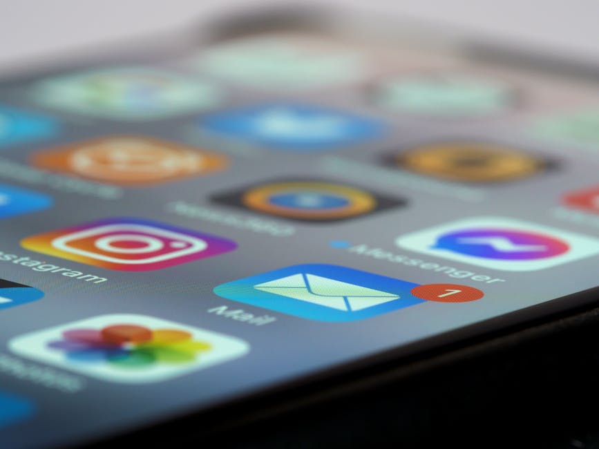 Detailed close-up of smartphone screen displaying various app icons and notifications.