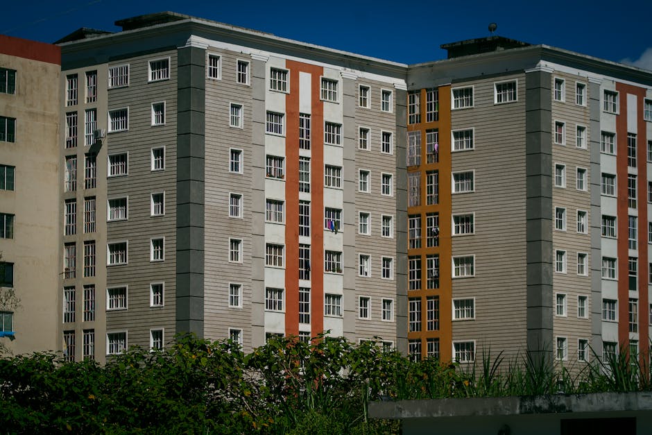 High-rise modern apartment buildings with glass windows in Venezuela, capturing architectural design.