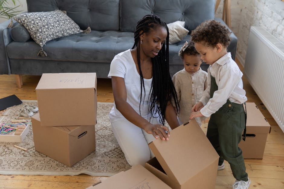 Mother and children unboxing in a cozy living room setting.