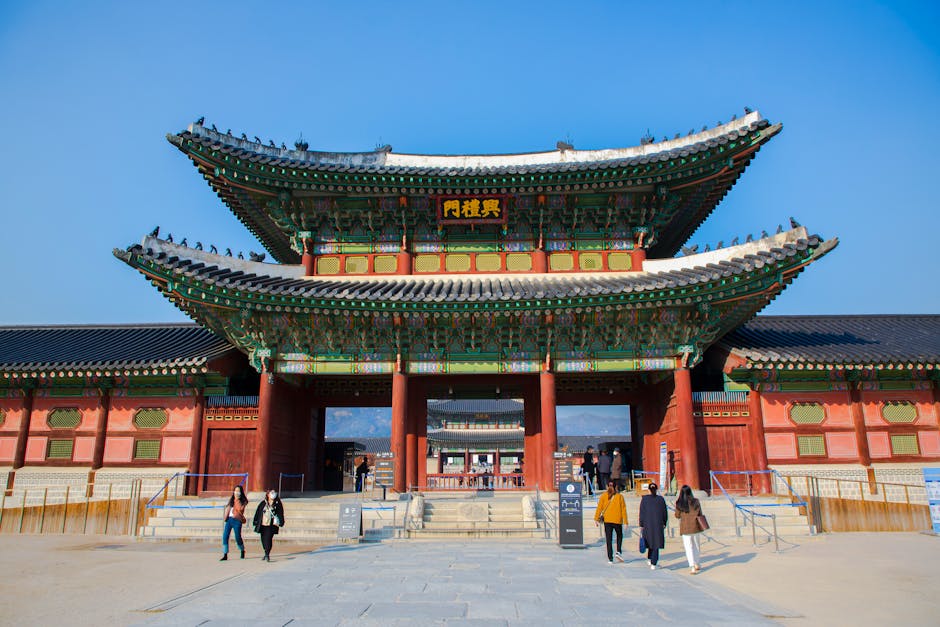 Front view of Gwanghwamun Gate at Gyeongbokgung Palace in Seoul, showcasing traditional Korean architecture.