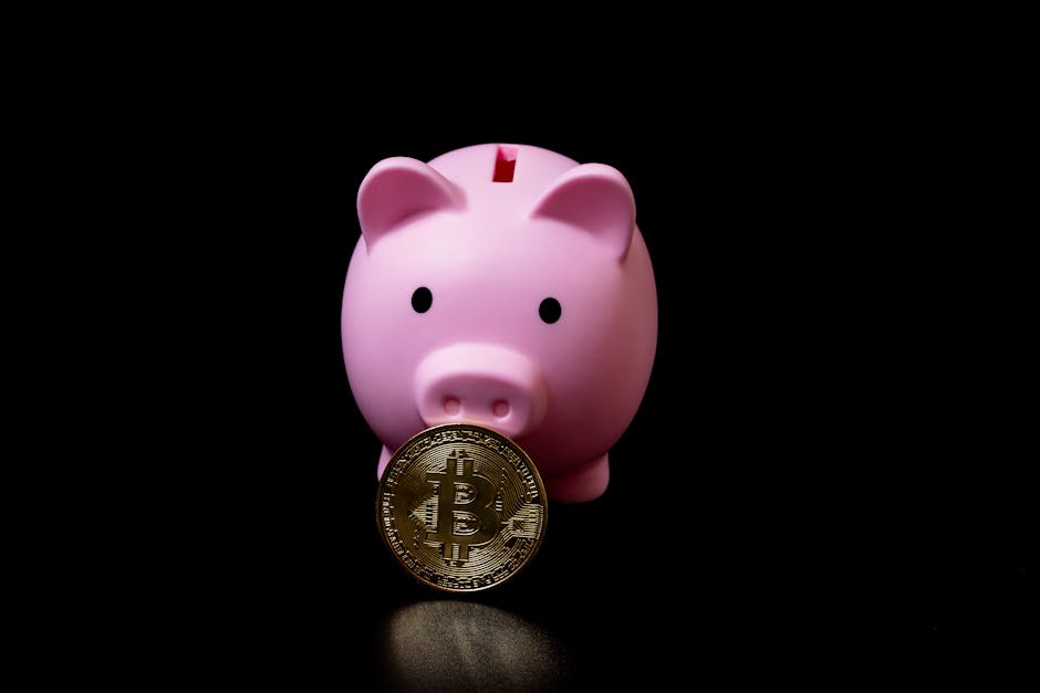 Pink piggy bank holding a bitcoin coin symbolizing modern digital investments.