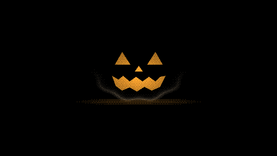 A jack-o'-lantern in the dark, only its carved face glowing amber