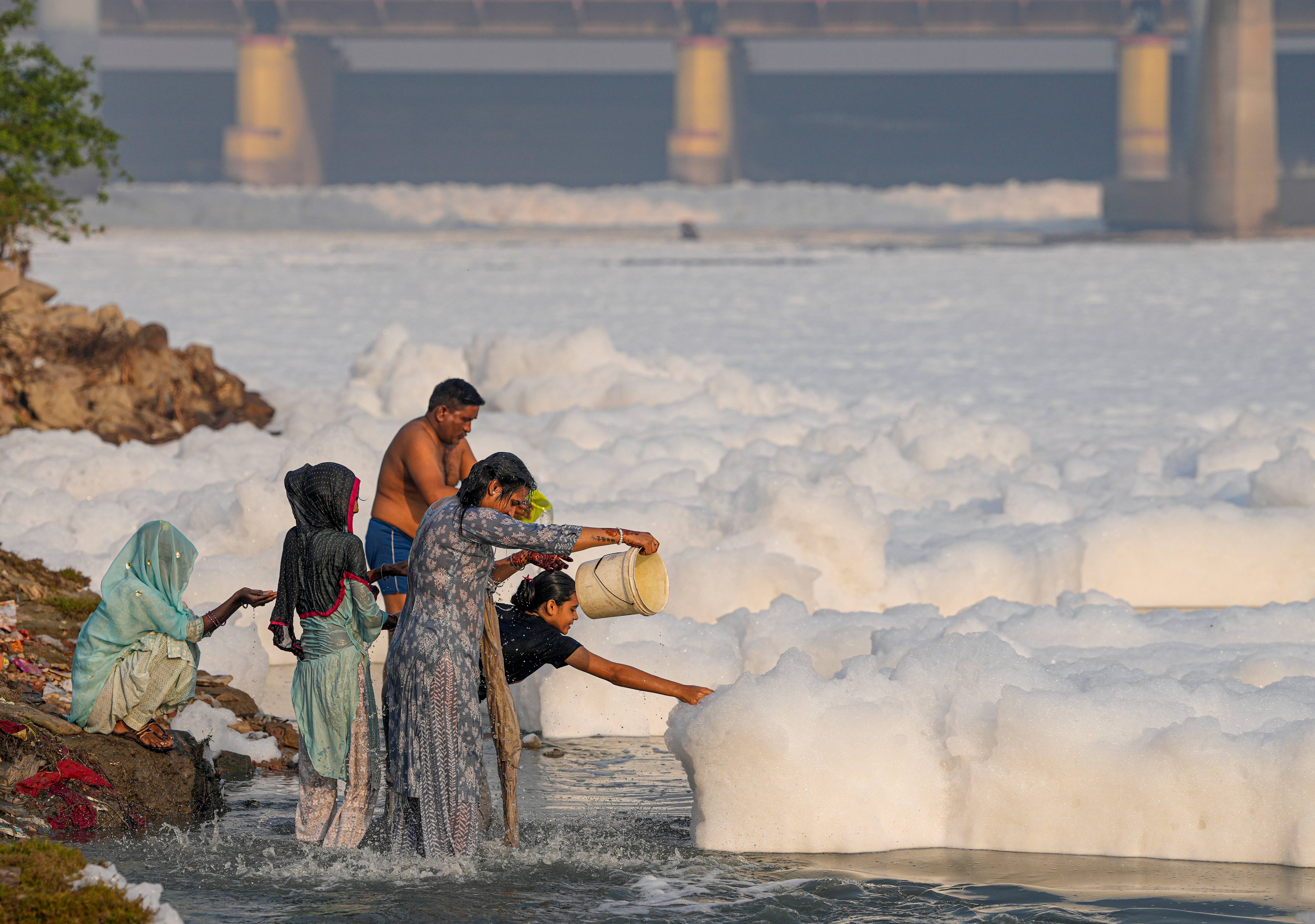 Yamuna river covered with toxic foam.