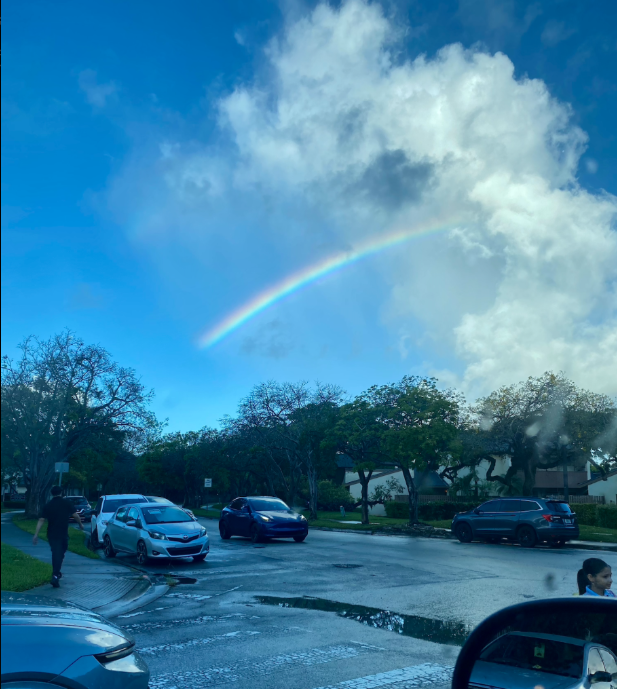 Rainbow over a Miami road