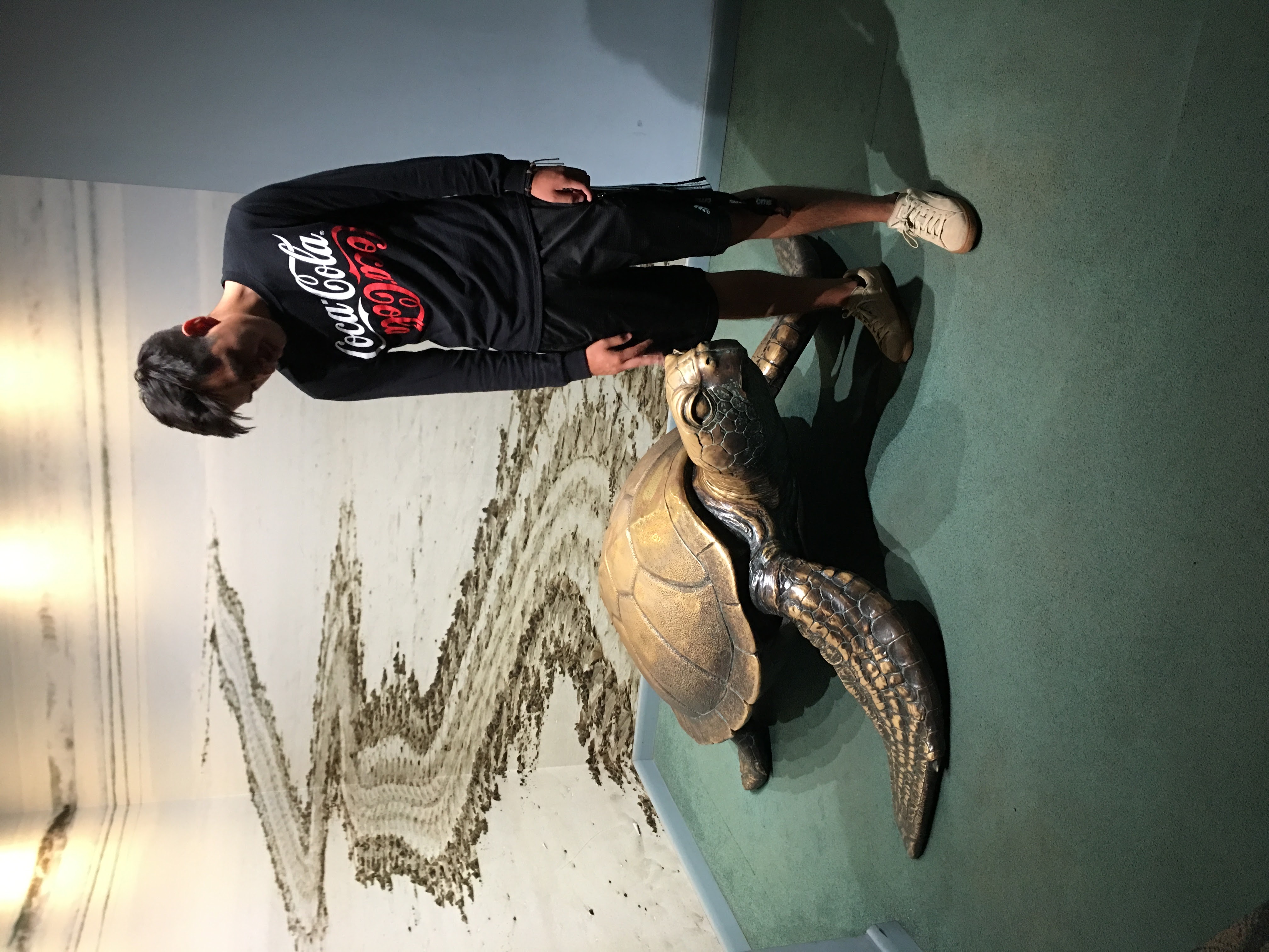 Picture of me next to a turtle