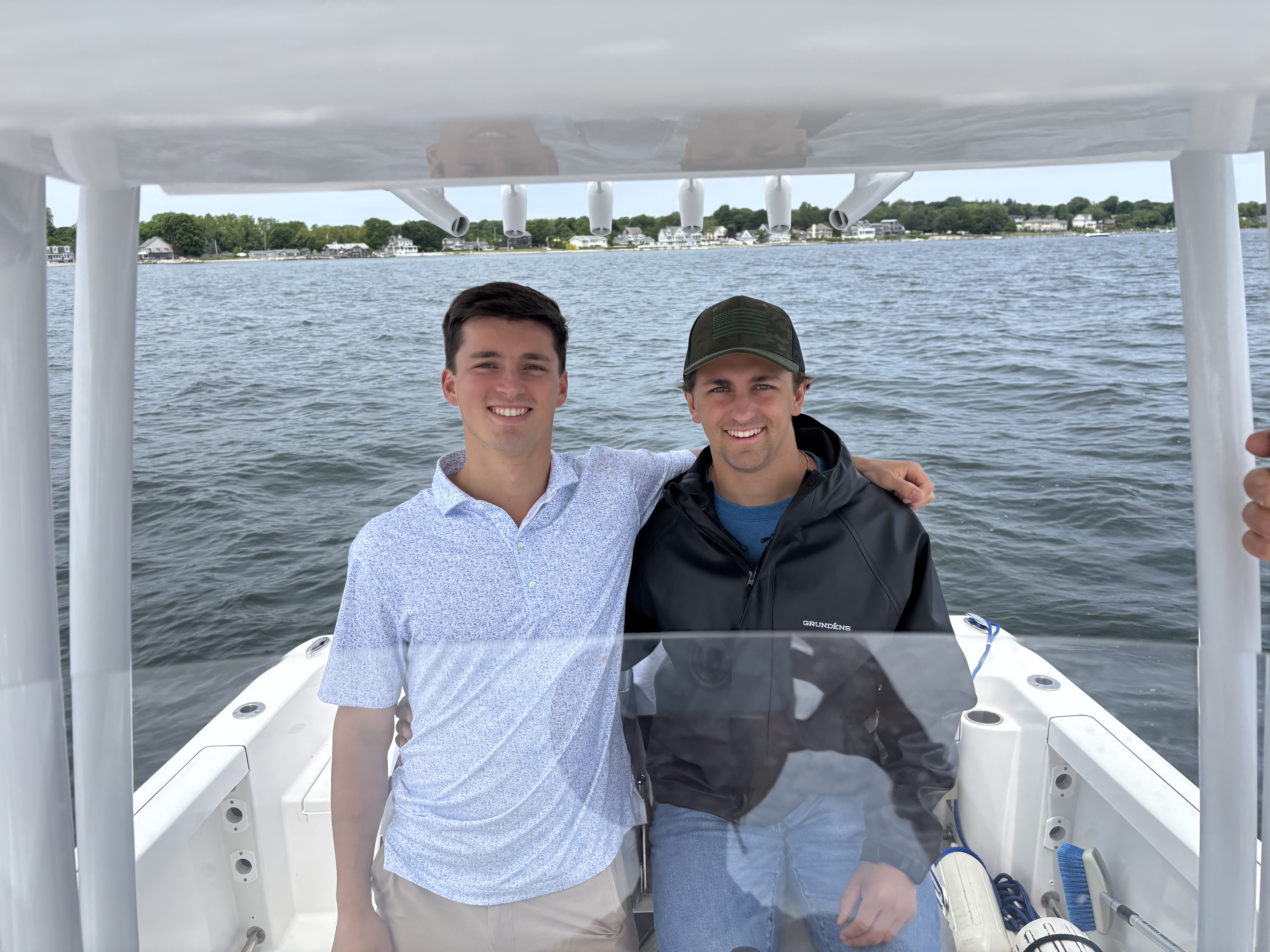 Captain Nik and his brother aboard One Day