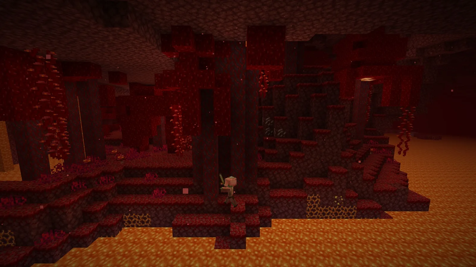 A crimson forest in the Nether with a zombified piglin