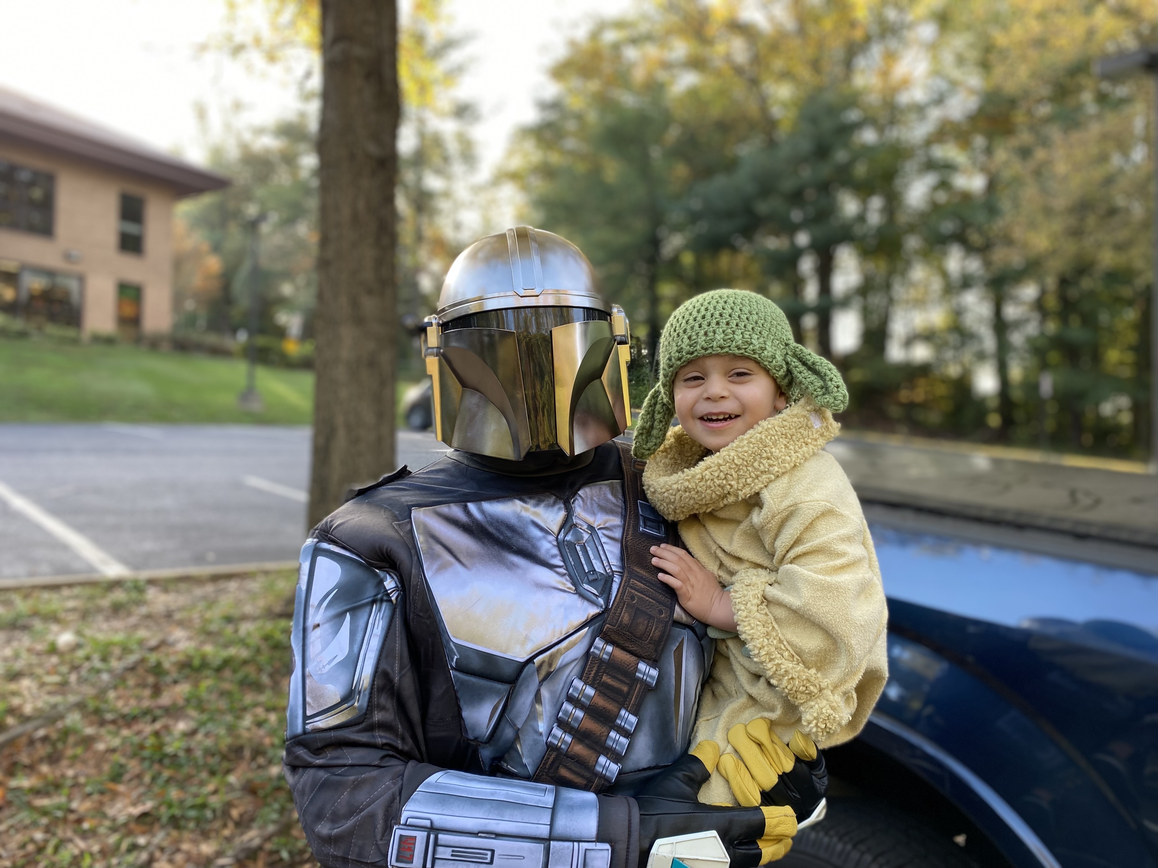 A picture of Brett and his son in Star Wars costumes