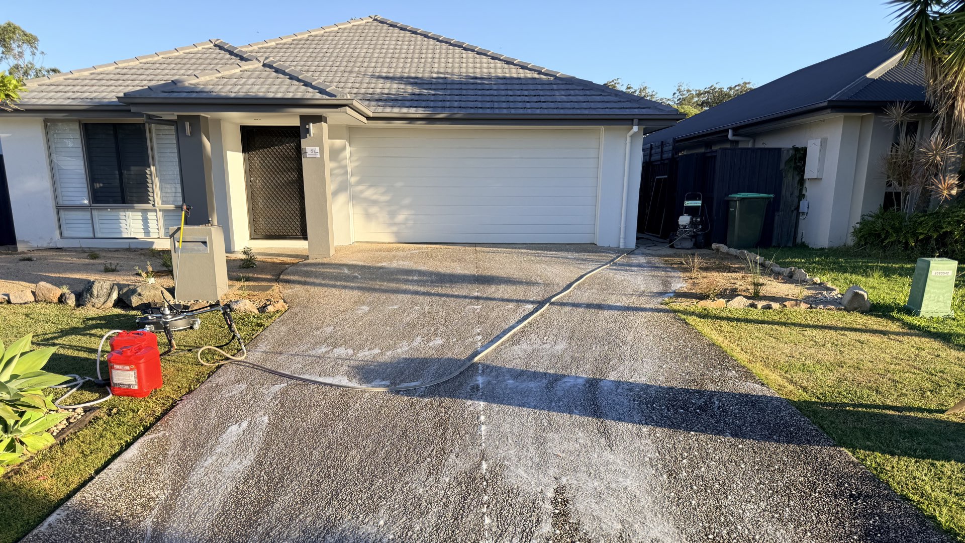 Pressure washed concrete driveway on the Sunshine Coast