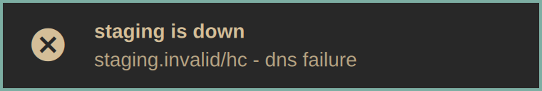 A desktop notification reading "staging is down"