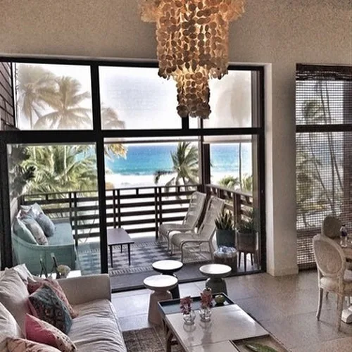 Villa de dos niveles en primera línea de playa · Fotografía 3