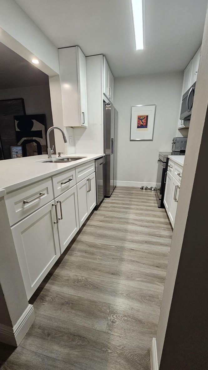 Kitchen with white cabinets