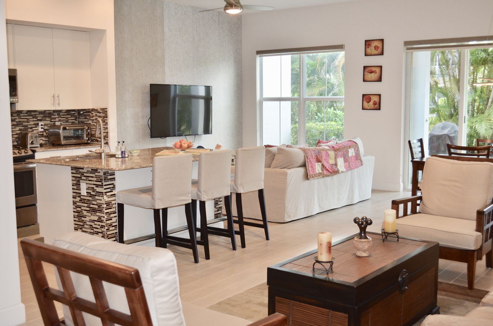 Living room and kitchen with breakfast bar