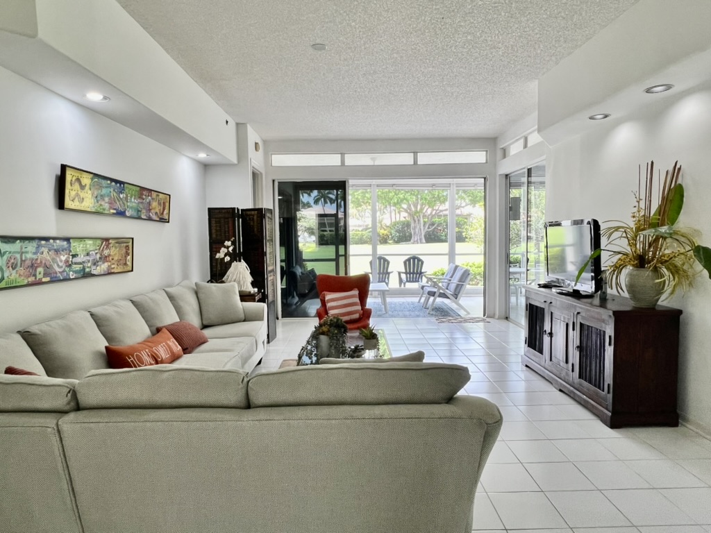 Living room with sectional sofa and colorful art