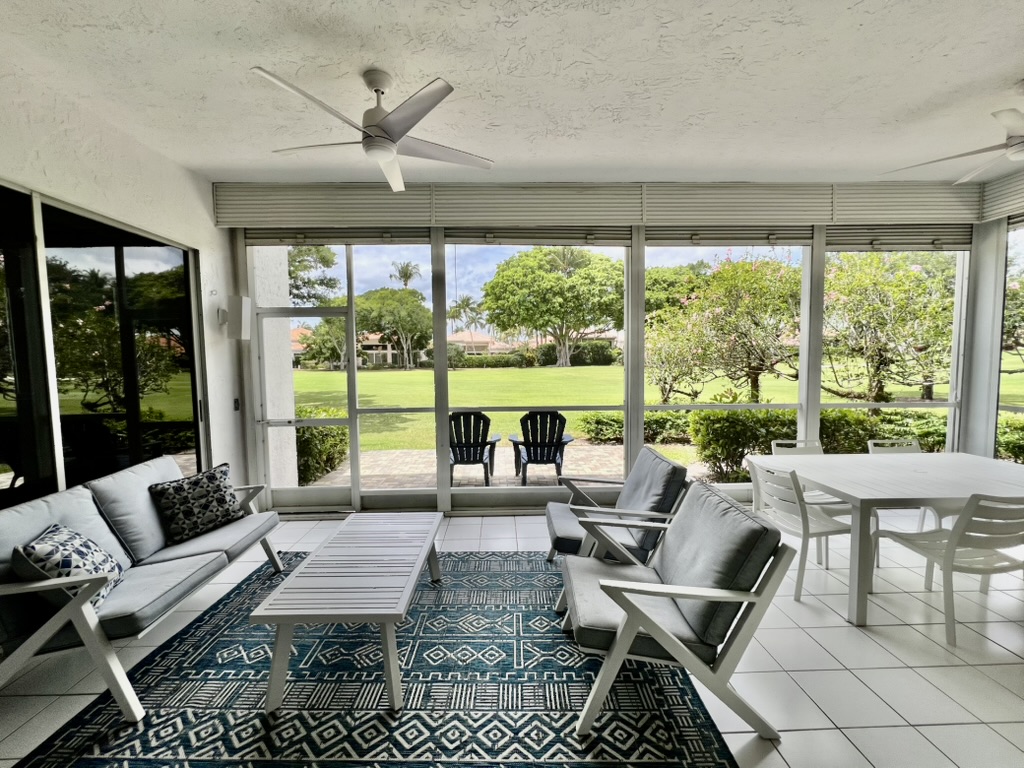 Screened terrace with golf course view
