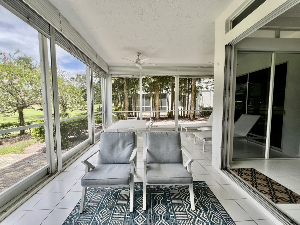Screened terrace seating area