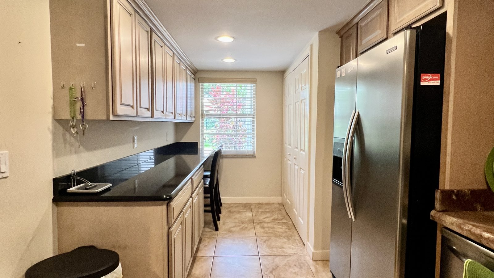 Galley kitchen with granite counters