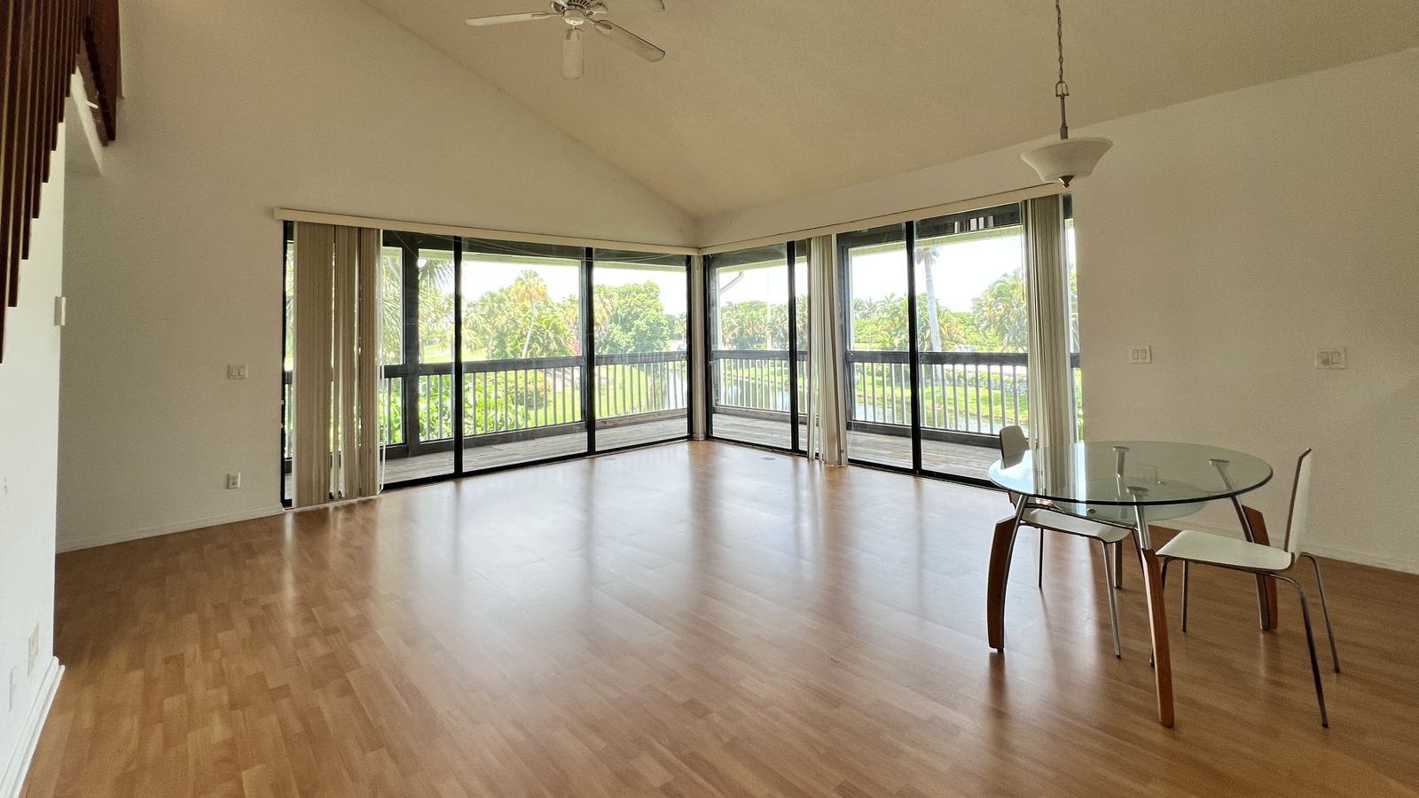 Living room with lake and golf views