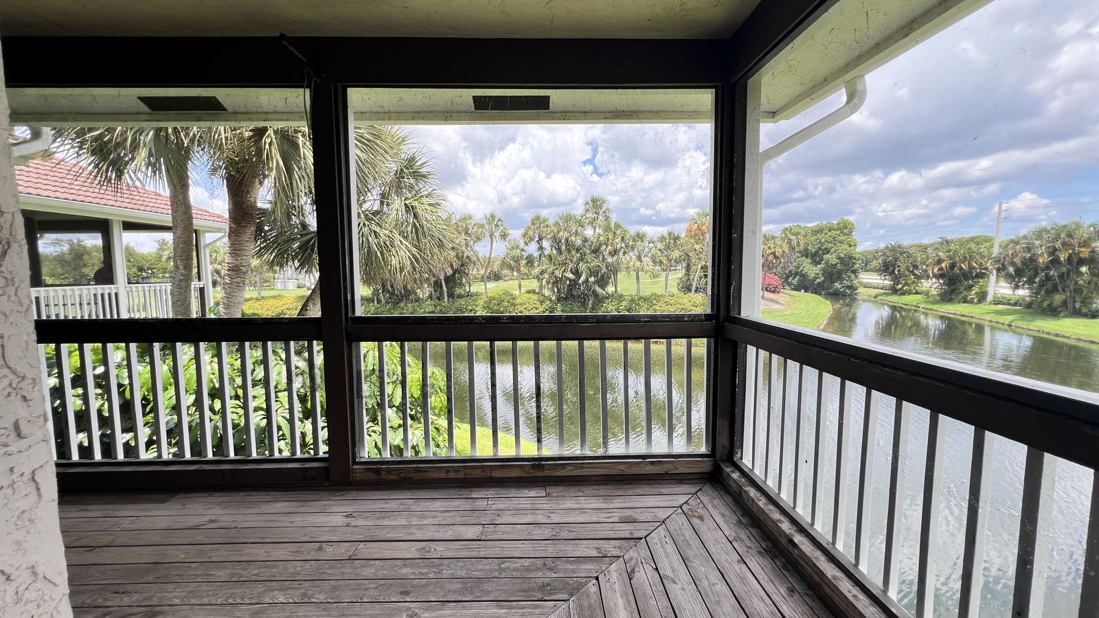 Screened porch with wood deck, lake view