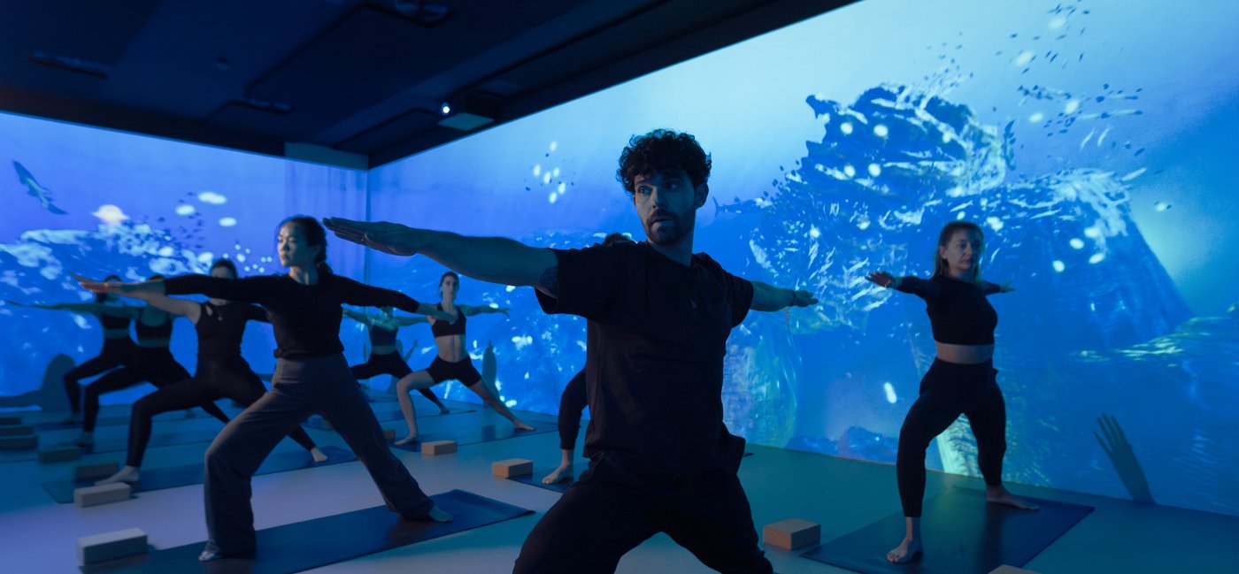 vinyasa yoga class inside SABDA 360 projection room Barcelona Eixample