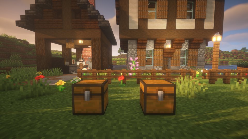 Two chests on the grass in front of the forge