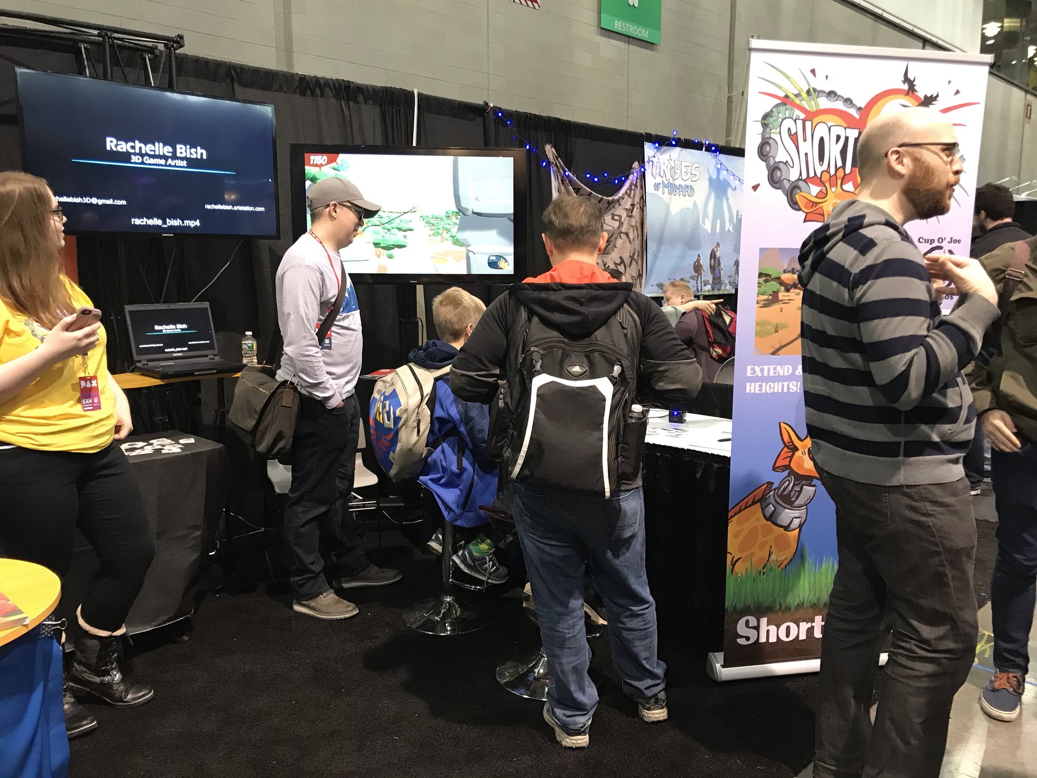 People playing Short Giraffe at our booth at Pax