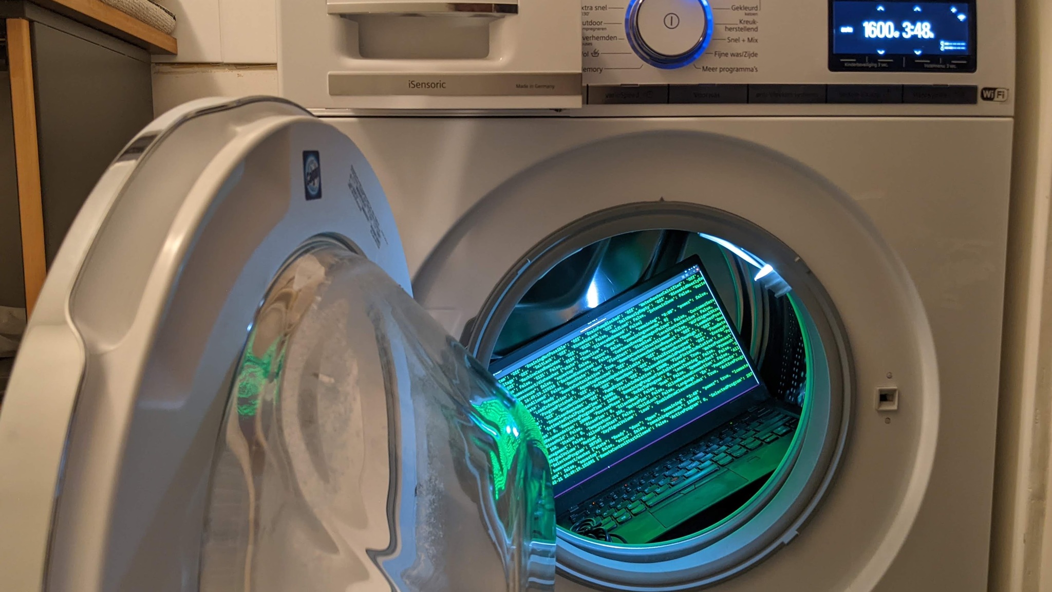 laptop in a clothes washer