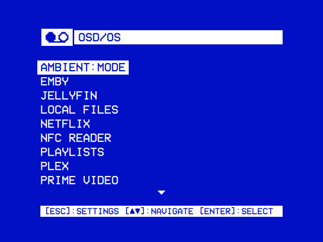 The main menu: OSD/OS's logo and name in the title bar, then the modules: AMBIENT:MODE, EMBY, JELLYFIN, LOCAL FILES, NETFLIX, NFC READER, PLAYLISTS, PLEX, PRIME VIDEO, and a ▼ for more