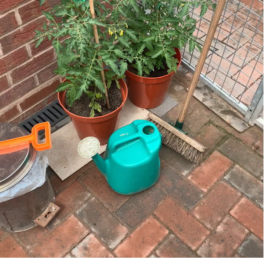 clutter frame of watering can