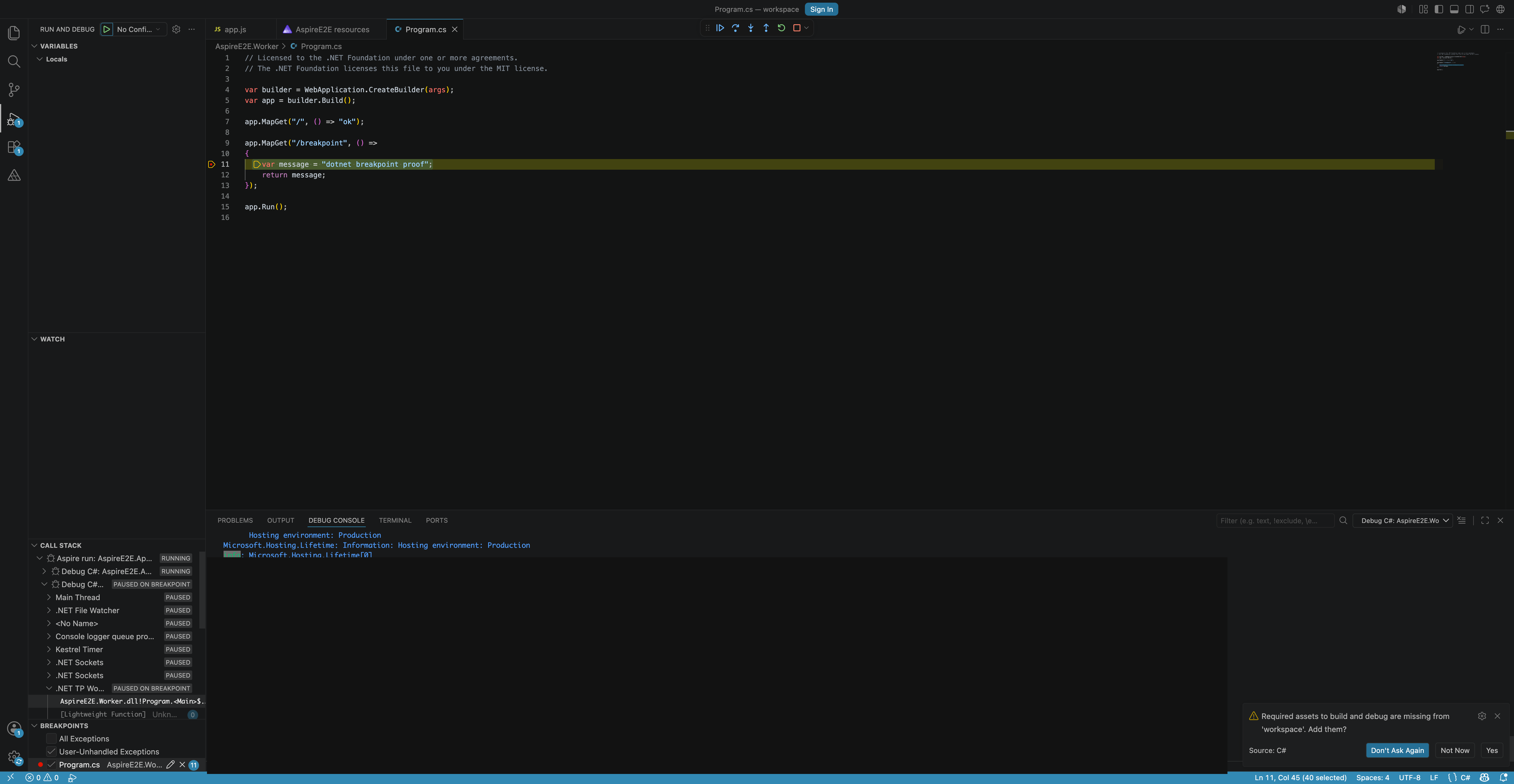 VS Code running and debugging an Aspire AppHost with resource debug sessions.