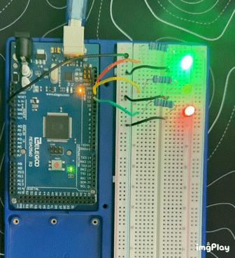LED traffic light cycling through green, yellow, and red