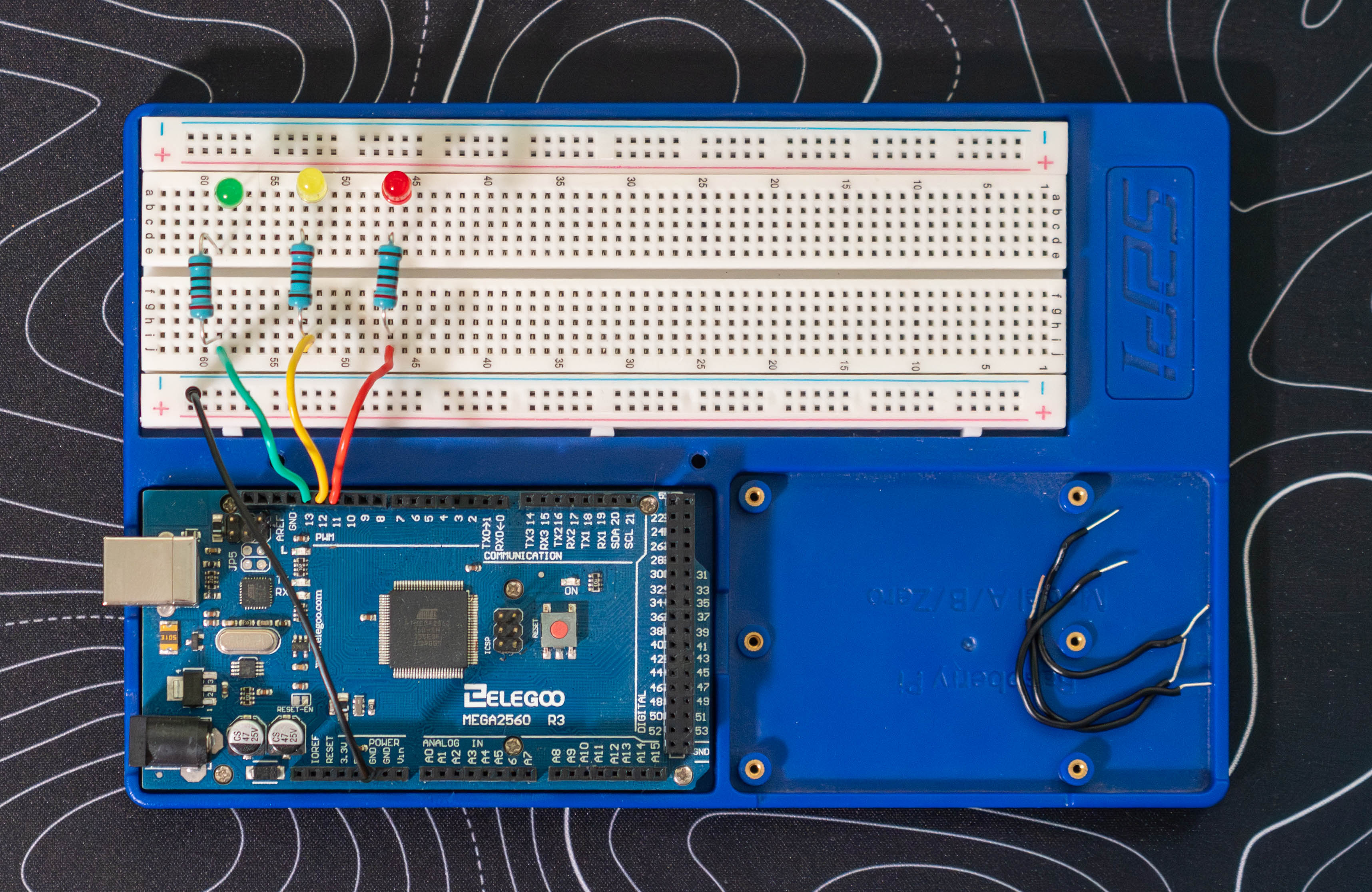 Jumper wires added from the resistors to Arduino pins 13, 12, and 11