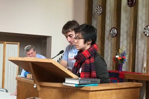 Caroline giving a speech in a meeting for Our Revolution -  Cambridge.