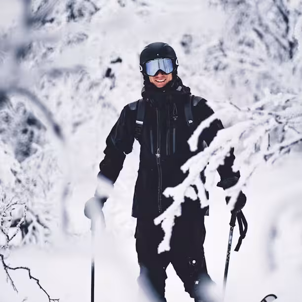 Person Smiling While Skiing