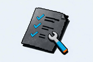 A maintenance checklist beside a wrench