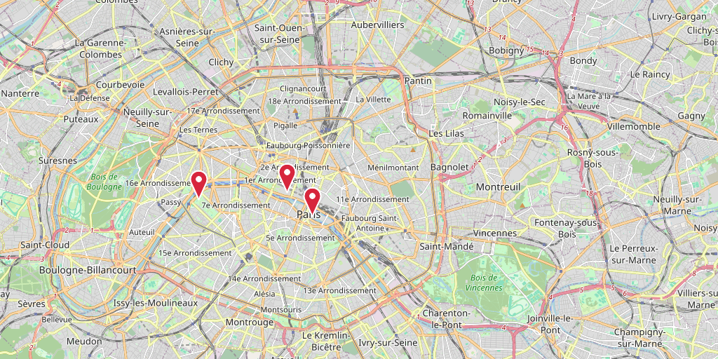 OpenStreetMap map of Paris with a red pin on the Eiffel Tower