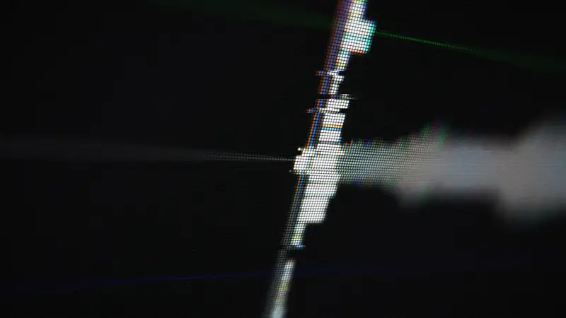 ff-unmute: a tilted close-up of a DAW timeline; the playhead sweeps a real waveform while tracker boxes lock onto kicks, bleeps and tokens; it ends on the whole track in one frame