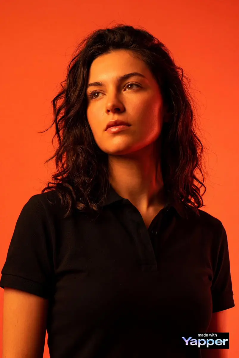 Create a high-impact editorial studio portrait using the ...