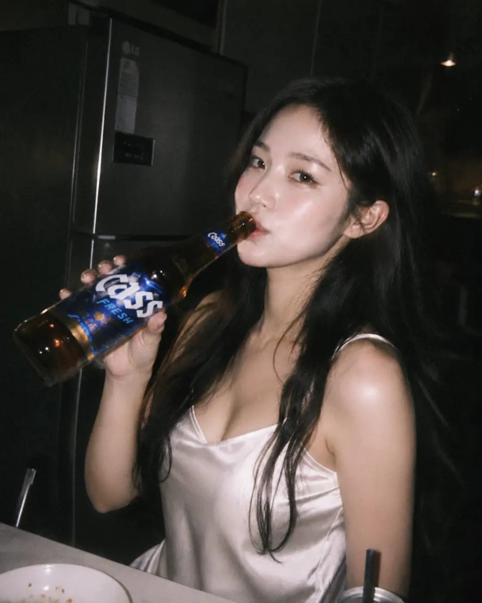 Ultra-realistic candid night photography of a beautiful E...
