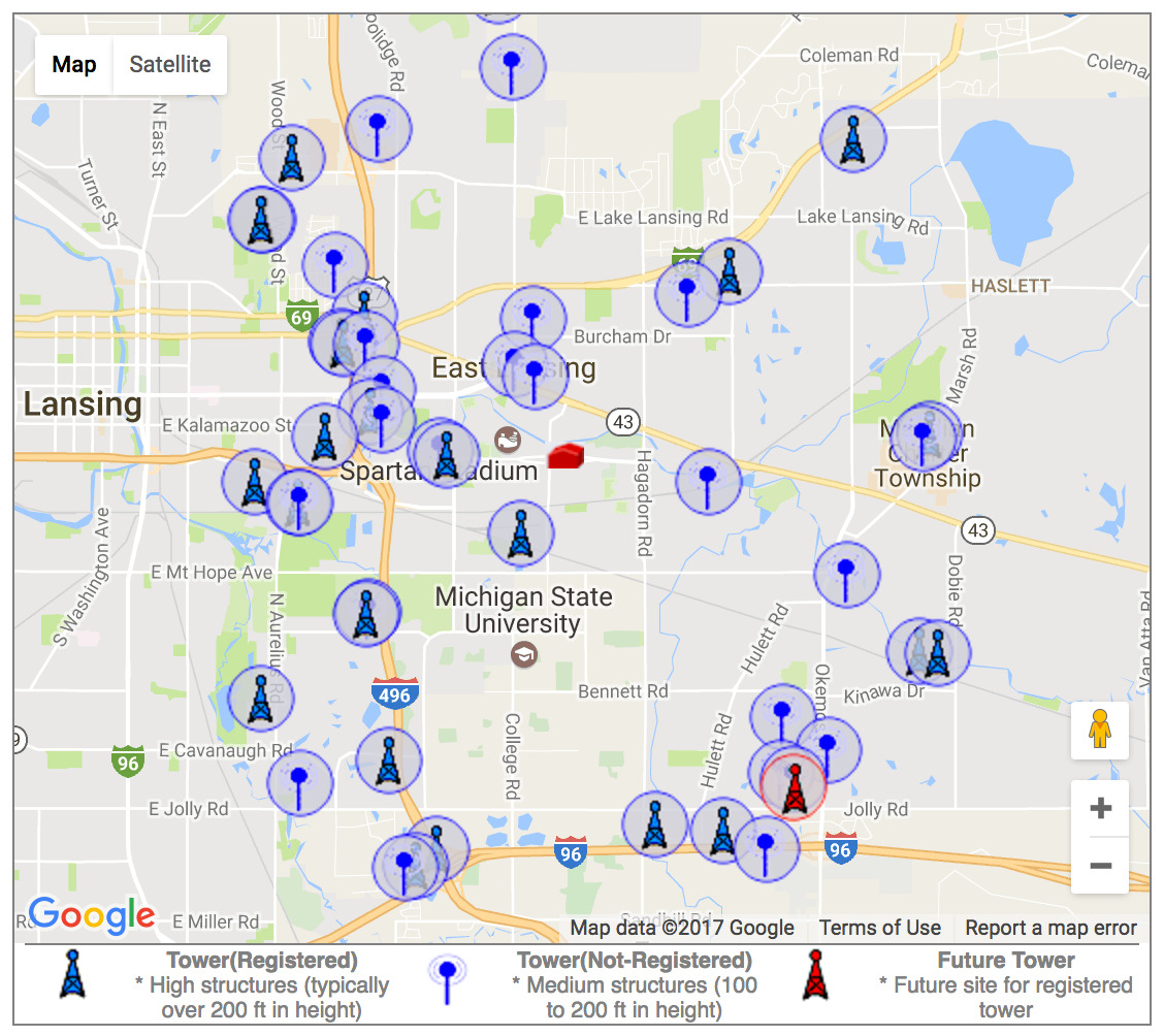 A map of the Lansing and East Lansing area around Michigan State University dotted with many cell-tower markers, showing their uneven real-world distribution.